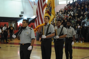 Members of Woodbridge High's new JROTC program present the colors during the winter pep rally.