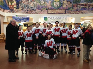 The 2015-2016 Woodbridge Barrons Ice Hockey Team speak with Woodbridge Township Mayor McCormac after their win over Colonia-JFK in the semifinals of the GMC Tournament. The Barrons beat the crosstown rivals 11-2 to advance to the GMC Finals. (Photo: Brian O'Halloran)